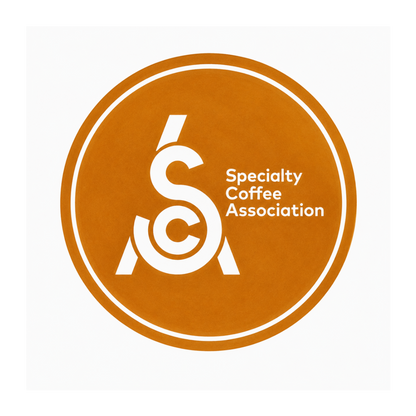 Specialty Coffee Association logo on a brown background